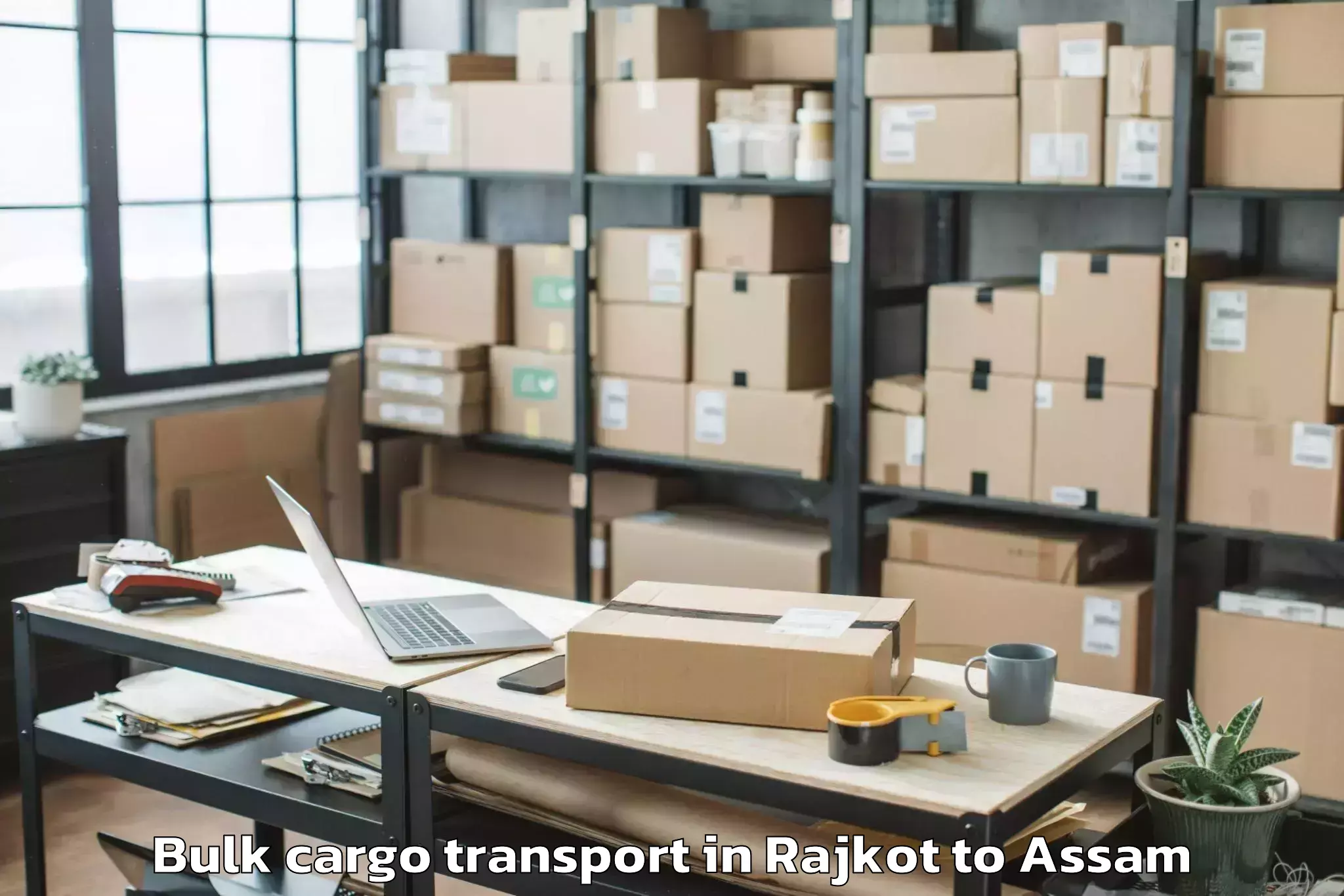 Quality Rajkot to Rajakhat Banekuchi Bulk Cargo Transport